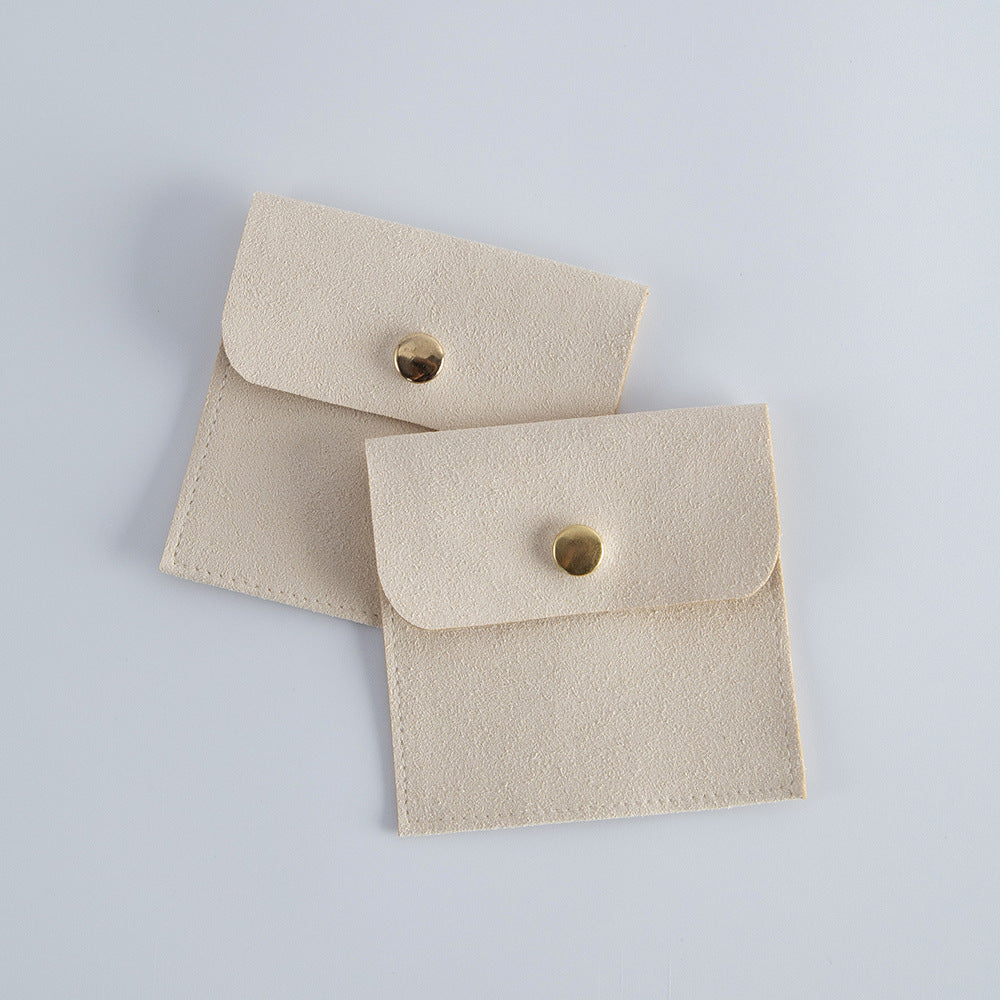 Mini velvet jewelry gift pouch with compact snap-button design