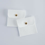 Soft velvet wedding party gift pouch with polished gold-tone closure