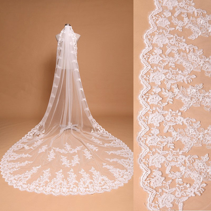 Ivory cathedral veil with floral lace edging
