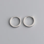 Minimal round huggie earrings with hinged closure