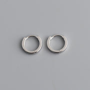Polished minimal hoop earrings for bridal styling