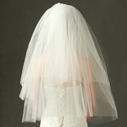 Juliette classic bridal veil displayed from the back with a softly voluminous layered silhouette