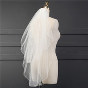 Back view of the Elise minimalist bridal veil with sheer fabric and a clean finished edge