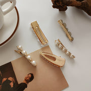 Gold tone white pearl side hair accessory