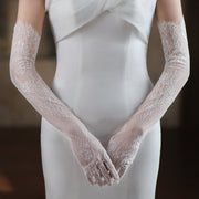 Florence ivory-white floral lace bridal gloves with sheer lace and decorative edging