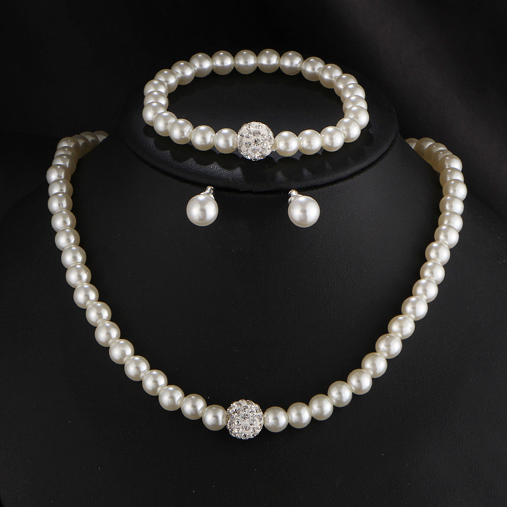 Margaux ivory bridal jewelry set with pearl inspired details