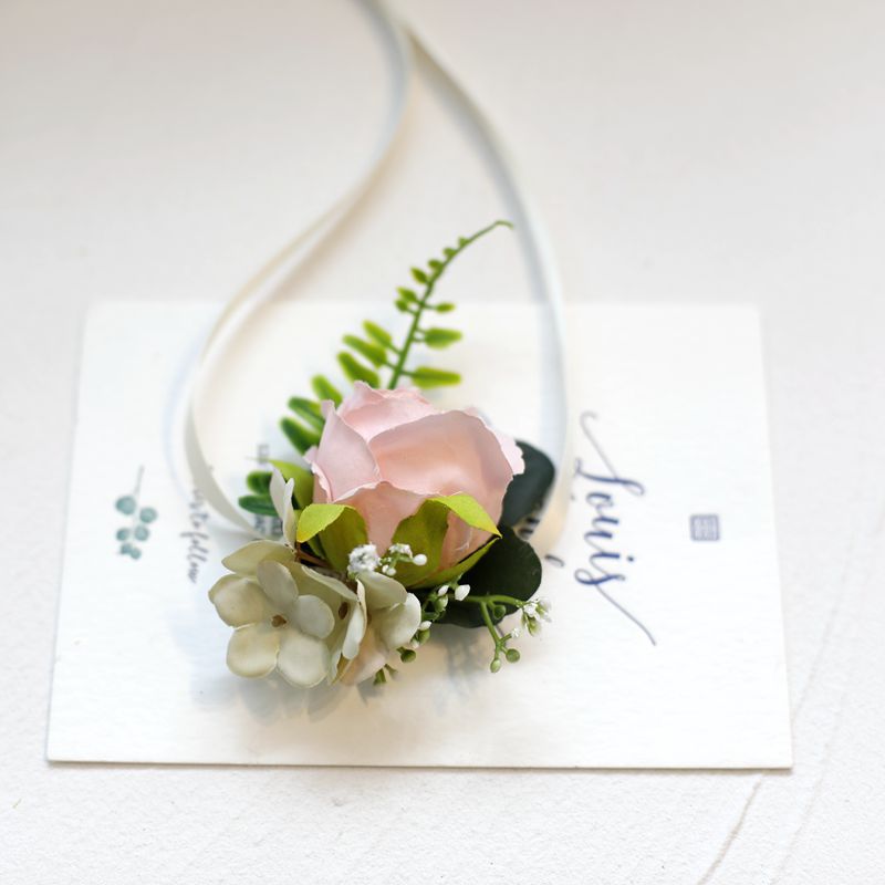 Romantic floral bridesmaid wrist corsage in wedding color options