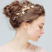 Crystal Blossom bridal hair comb with gold-tone floral branches and pearl-style accents