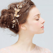 Crystal Blossom wedding hair comb featuring delicate floral and crystal-style details