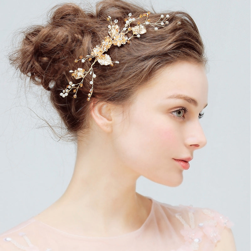 Crystal Blossom floral bridal comb with pearl-inspired beads and sparkling accents