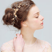 Crystal Blossom gold-tone botanical hair comb for romantic wedding hairstyles