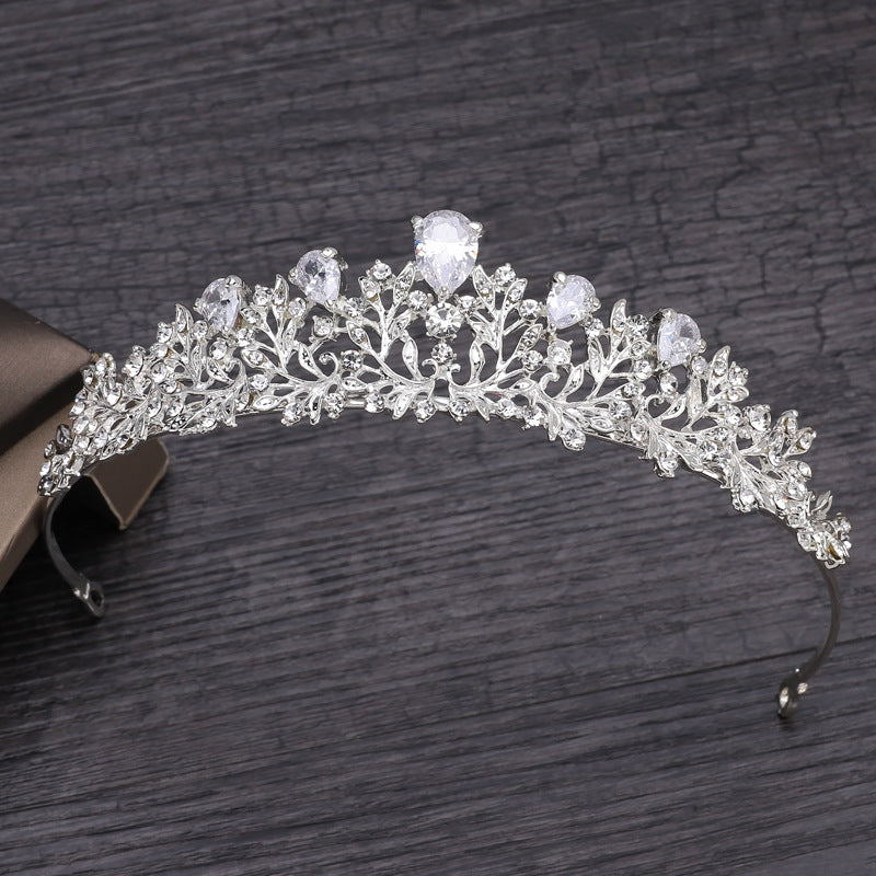 Vivienne Crystal Classic bridal tiara with sparkling crystal-style embellishments on a dark background