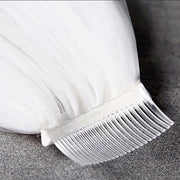 Close-up of the attached hair comb on the Celestine cathedral wedding veil