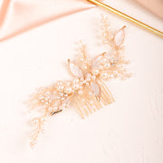 Gold bridal hair comb with leaf motifs and pearls