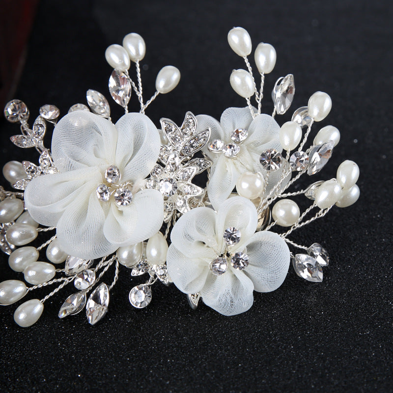 Rosalie Pearl Blossom bridal hairpiece with decorative floral accents