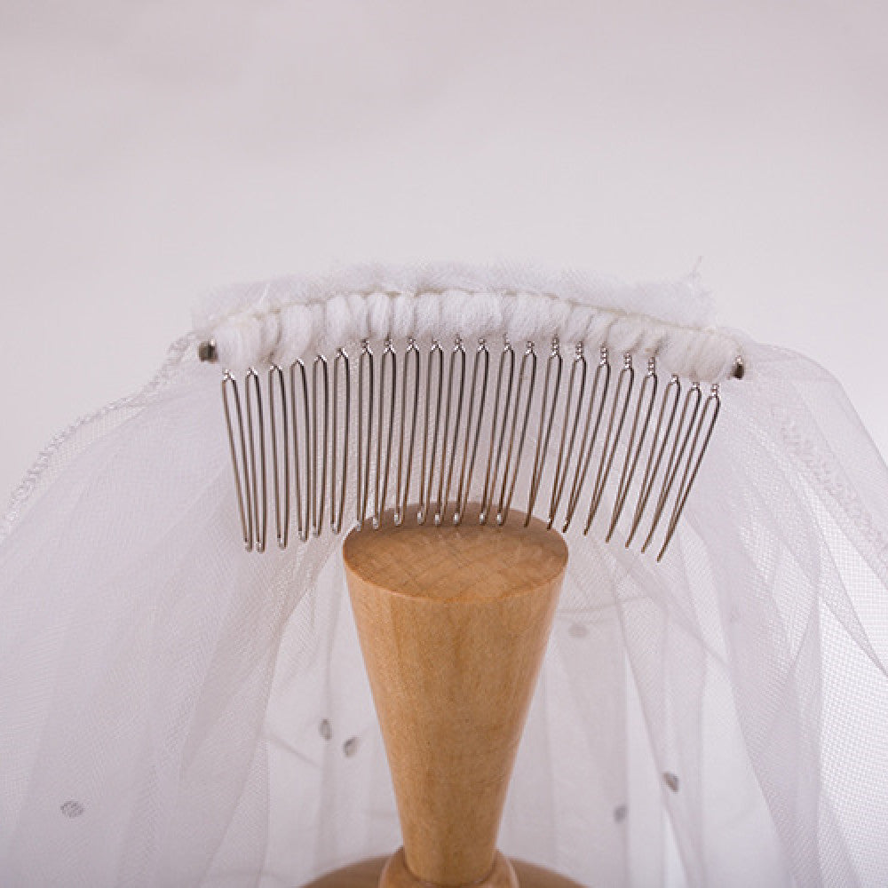 Short white wedding veil with rhinestone details
