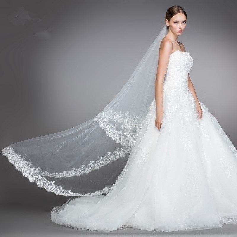 Vivienne white bridal veil with delicate romantic lace edging