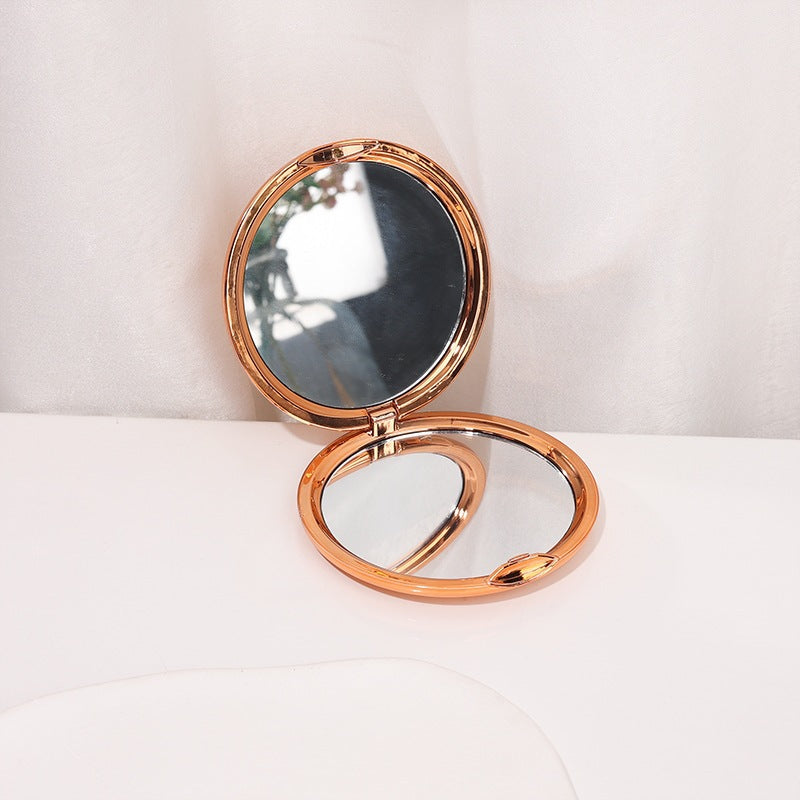 Aurelia champagne gold and rose gold compact mirror