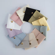 Margot velvet jewelry gift packaging with gold-tone snap detail