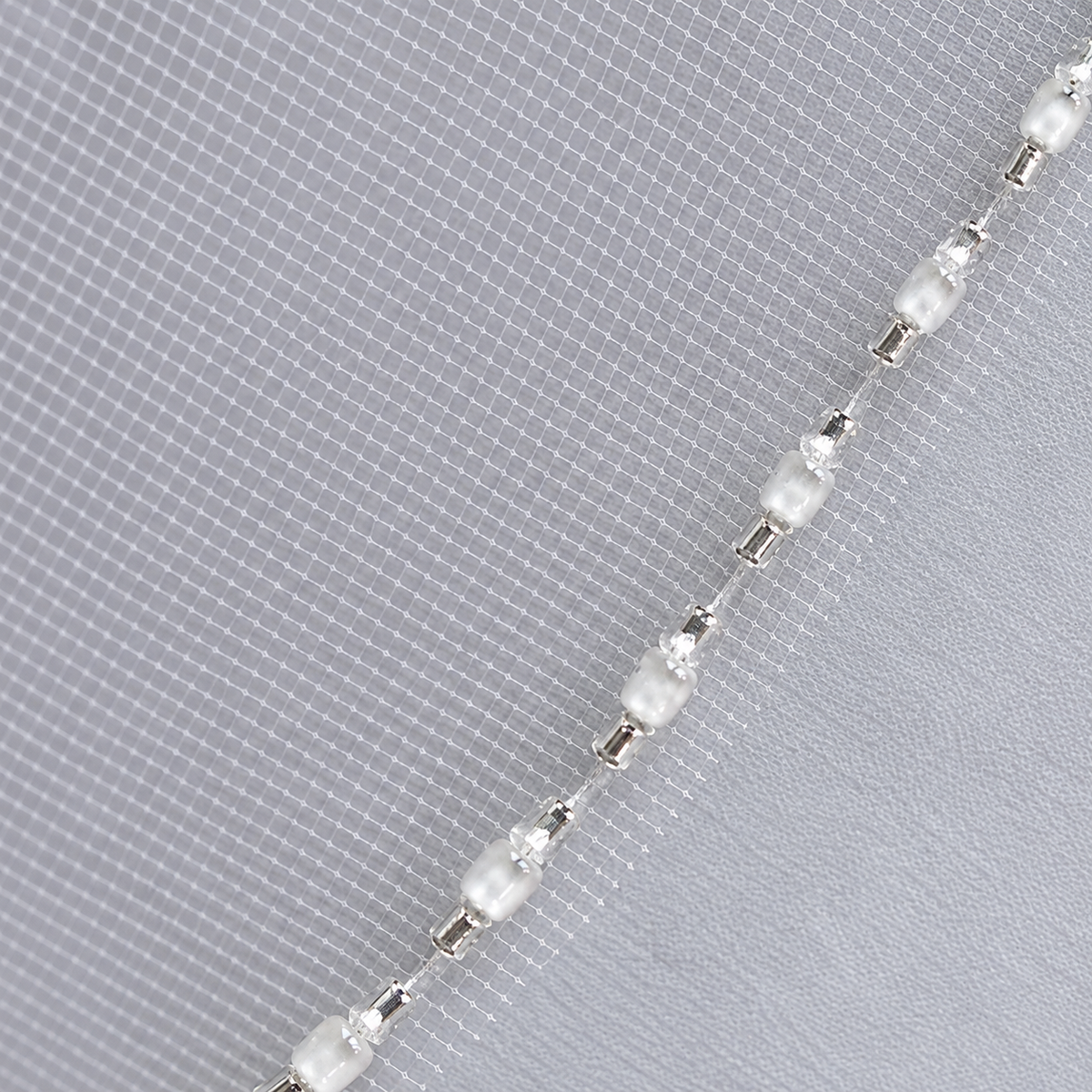 Beaded bridal veil mesh close up — Colette Crystal-Edge Fingertip Bridal Veil