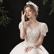 Romantic bridal portrait with pearl embellished gloves