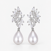 Elodie silver-tone leaf earrings with clear crystal-like accents and white teardrop pearl-style pendants