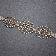 Gold vine bridal hair accessory with jeweled accents