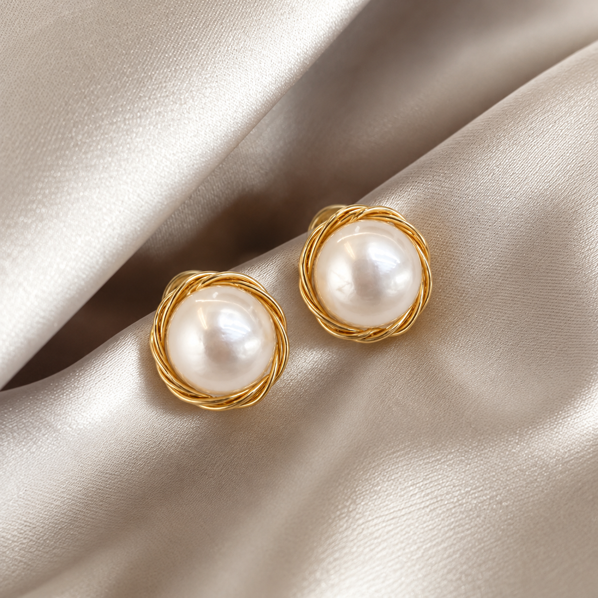 Pearl Earrings on Champagne Satin — The Clara Gold-Wrapped Natural Pearl Stud Earrings