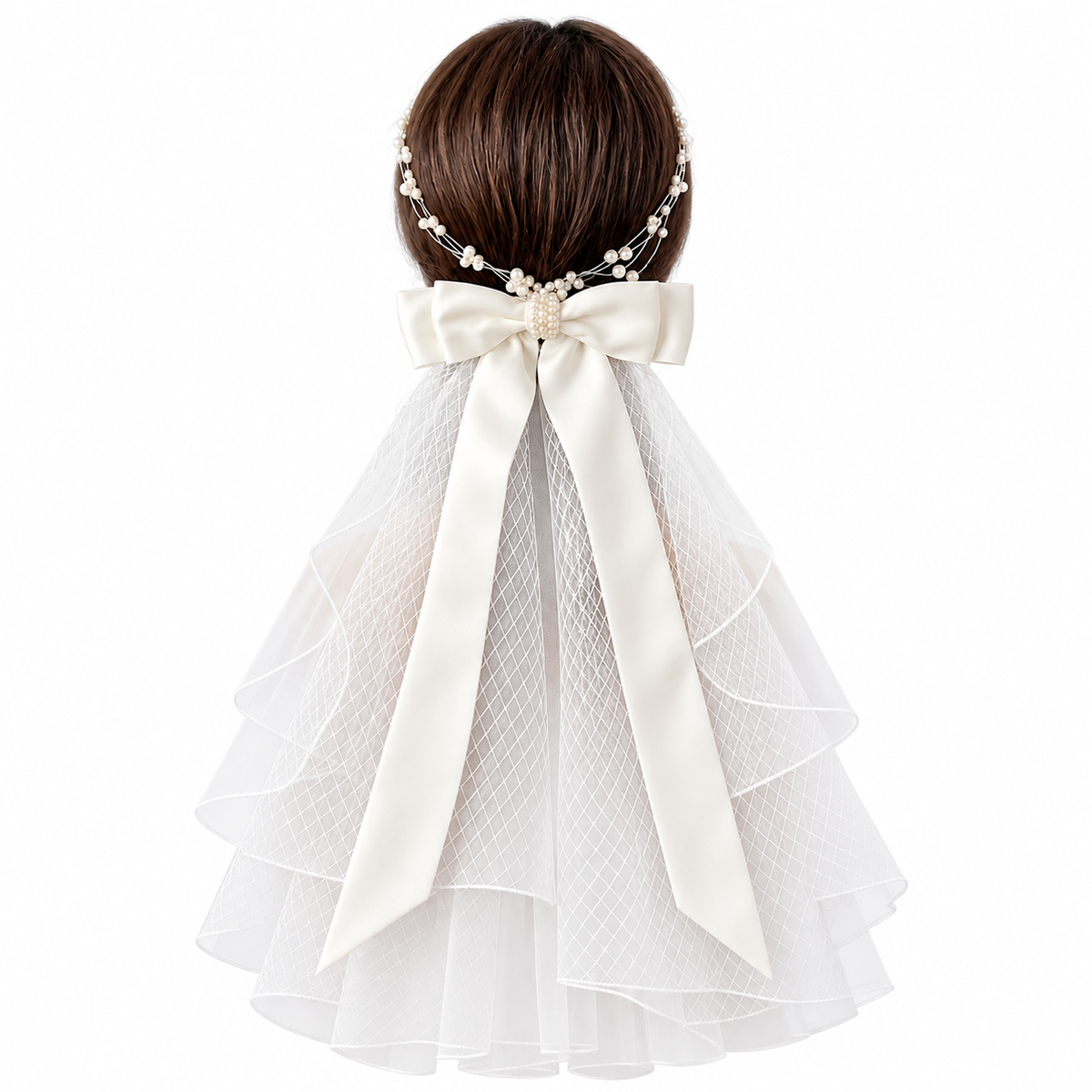 Colette oversized bow bridal veil with soft layered mesh and long ribbon tails shown from behind