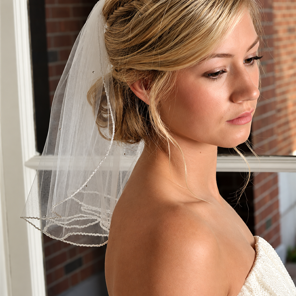 Serene Bride by the Brick Window — The Elodie White Rhinestone Short Bridal Veil