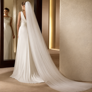 Veiled bride in a warm modern suite — Noelle Minimal Cathedral Bridal Veil
