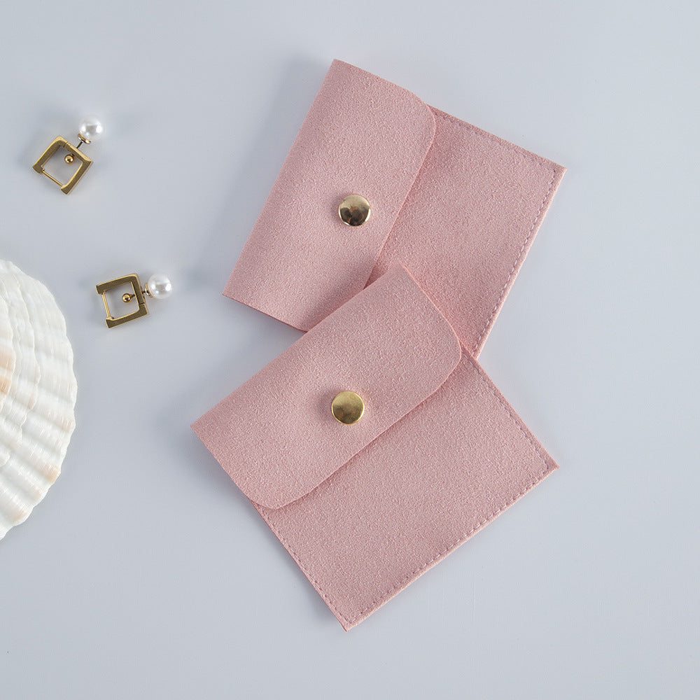 Margot compact jewelry pouch available in five soft colors