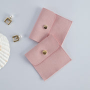 Margot compact jewelry pouch available in five soft colors