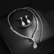 Matching wedding necklace and drop earrings with graduated crystal details