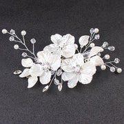 Floral wedding hairpiece in a delicate botanical silhouette