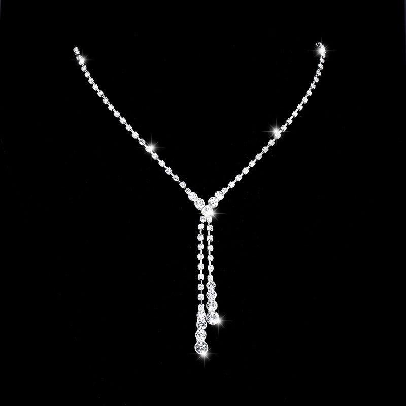 Seraphina silver-tone Y-shaped bridal necklace with sparkling crystal-style accents and cascading tassel drops