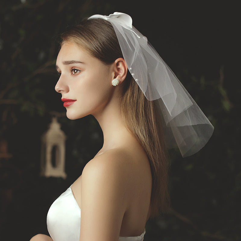 Beige pearl bow bridal veil for courthouse wedding or reception