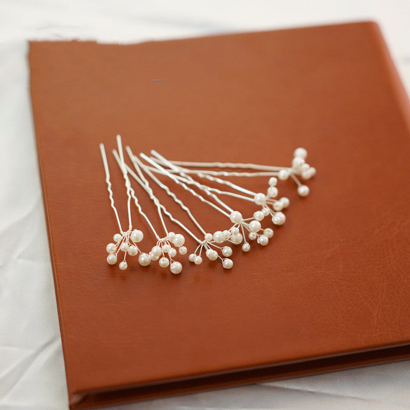 Odette pearl-inspired floral hair pin for wedding hairstyles