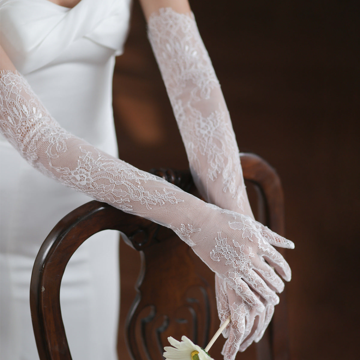 Florence bridal gloves showing delicate floral lace pattern and trim