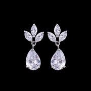 Pair of Isla crystal teardrop bridal earrings displayed against a black background