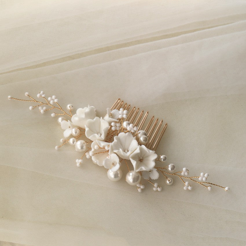 Ivory Blossom wedding hair accessory with pearl-inspired beads and branches