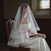Celeste satin-trim double-layer bridal veil shown in a product video