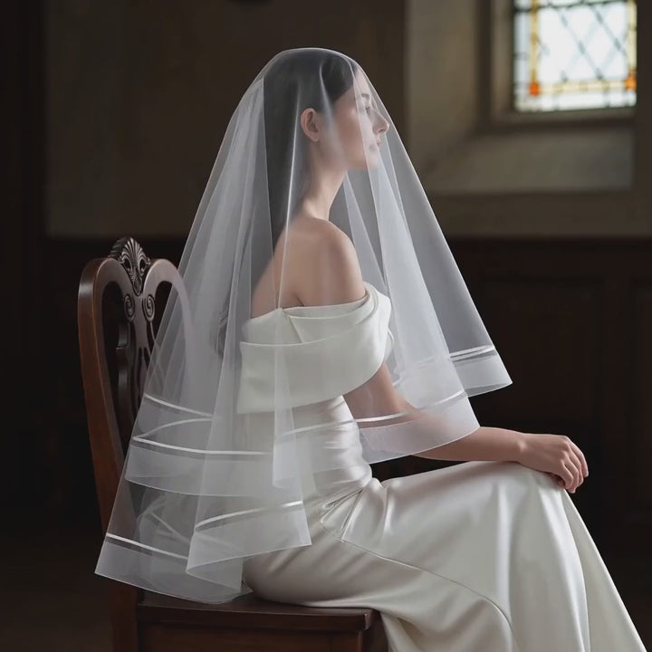 Celeste satin-trim double-layer bridal veil shown in a product video
