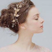 Model wearing the Crystal Blossom bridal hair comb, showing the floral design in the hair.