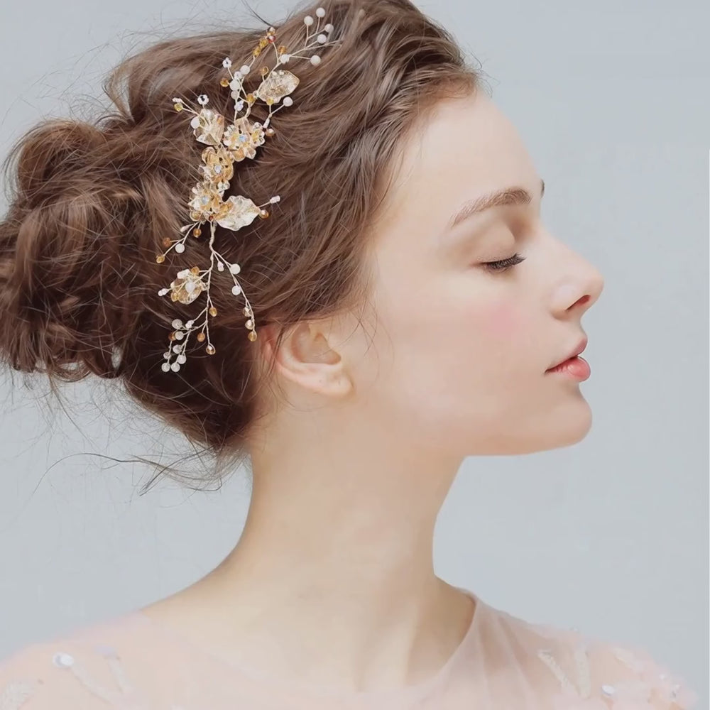 Model wearing the Crystal Blossom bridal hair comb, showing the floral design in the hair.